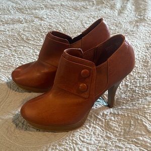 NWT Fioni booties. Size 10. Never worn. Slight defects-were there when purchased